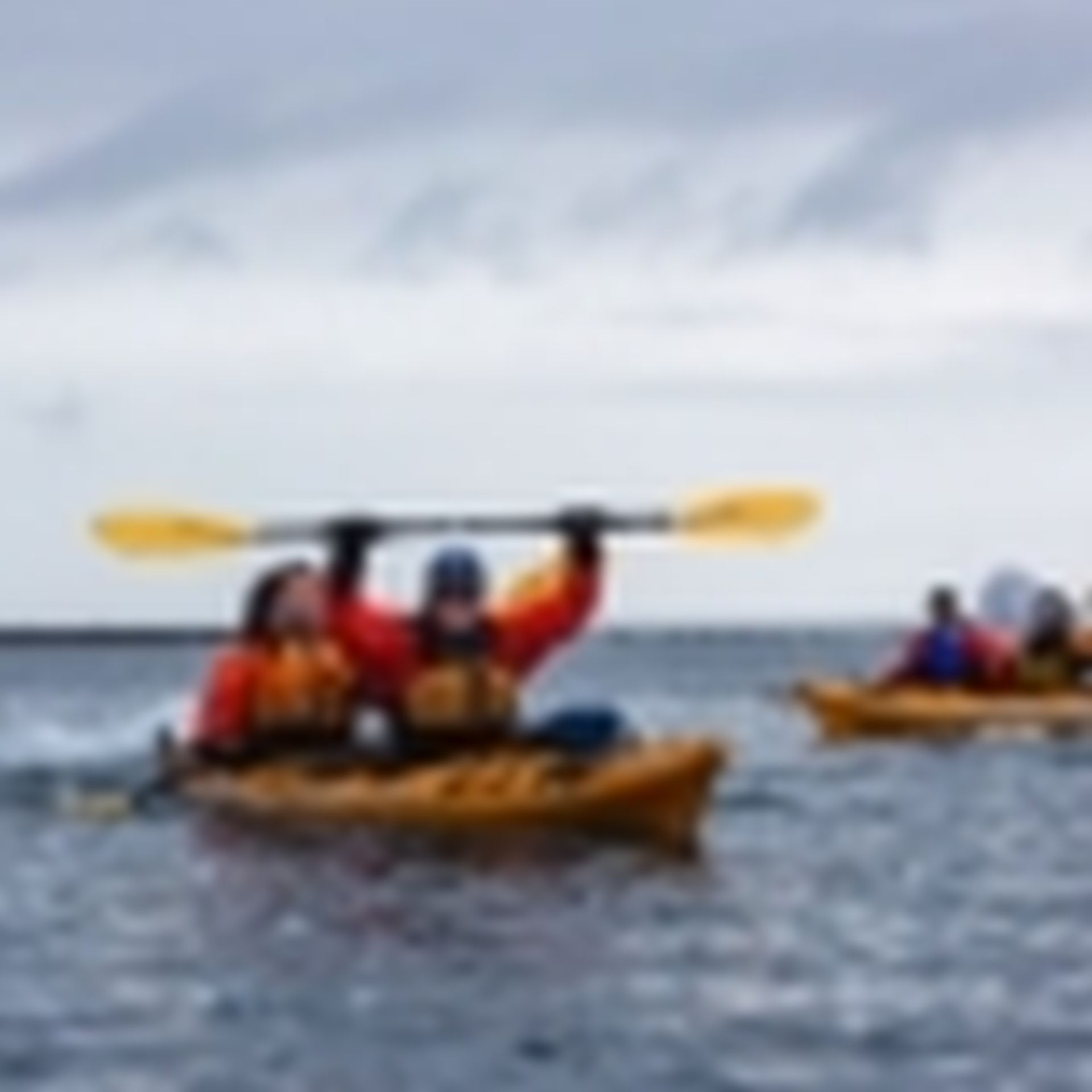 Inspiring Explorers kayaking in the Antarctic Peninsula