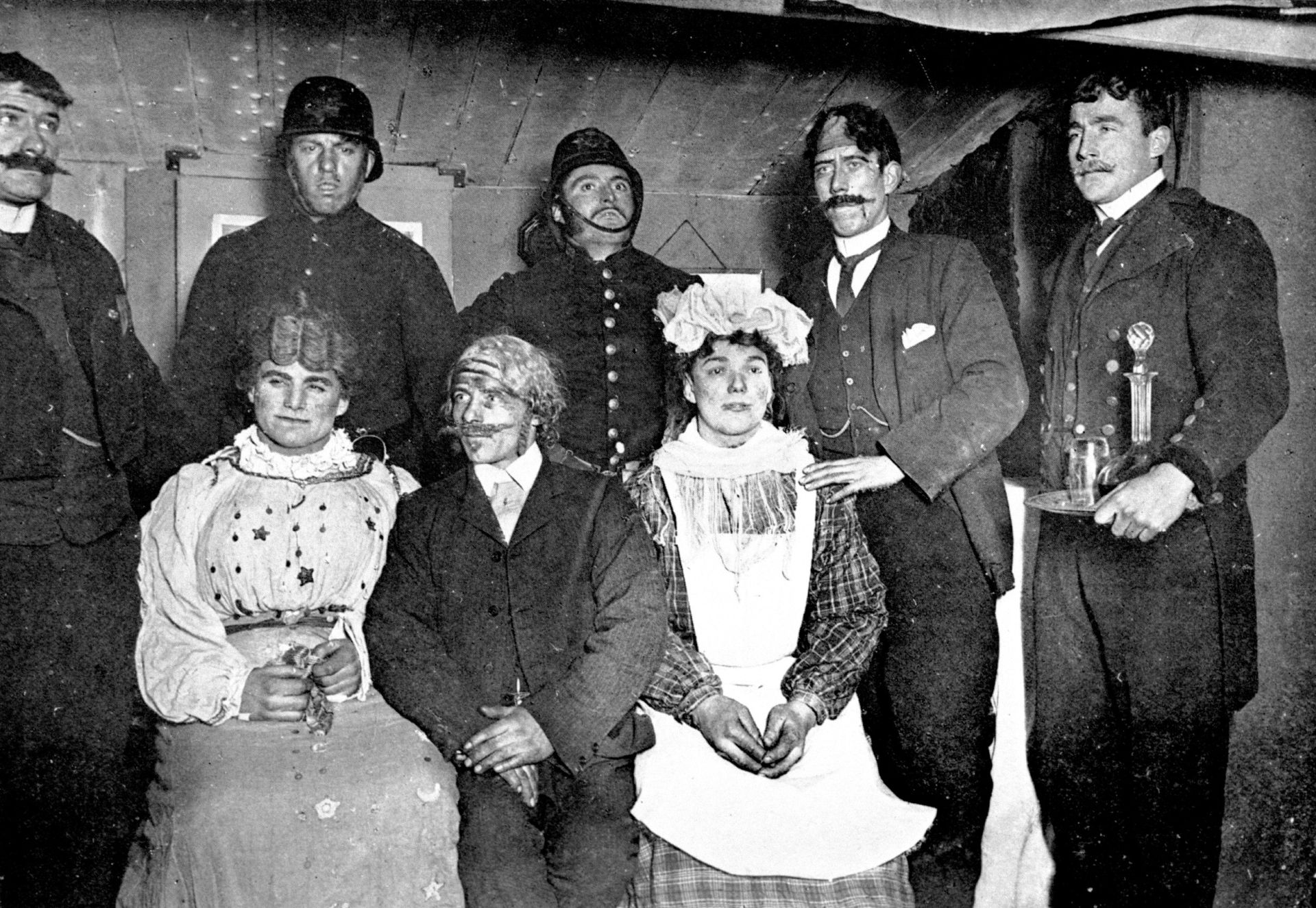 Men dressed up for the play Ticket of Leave at Hut Point, 1902