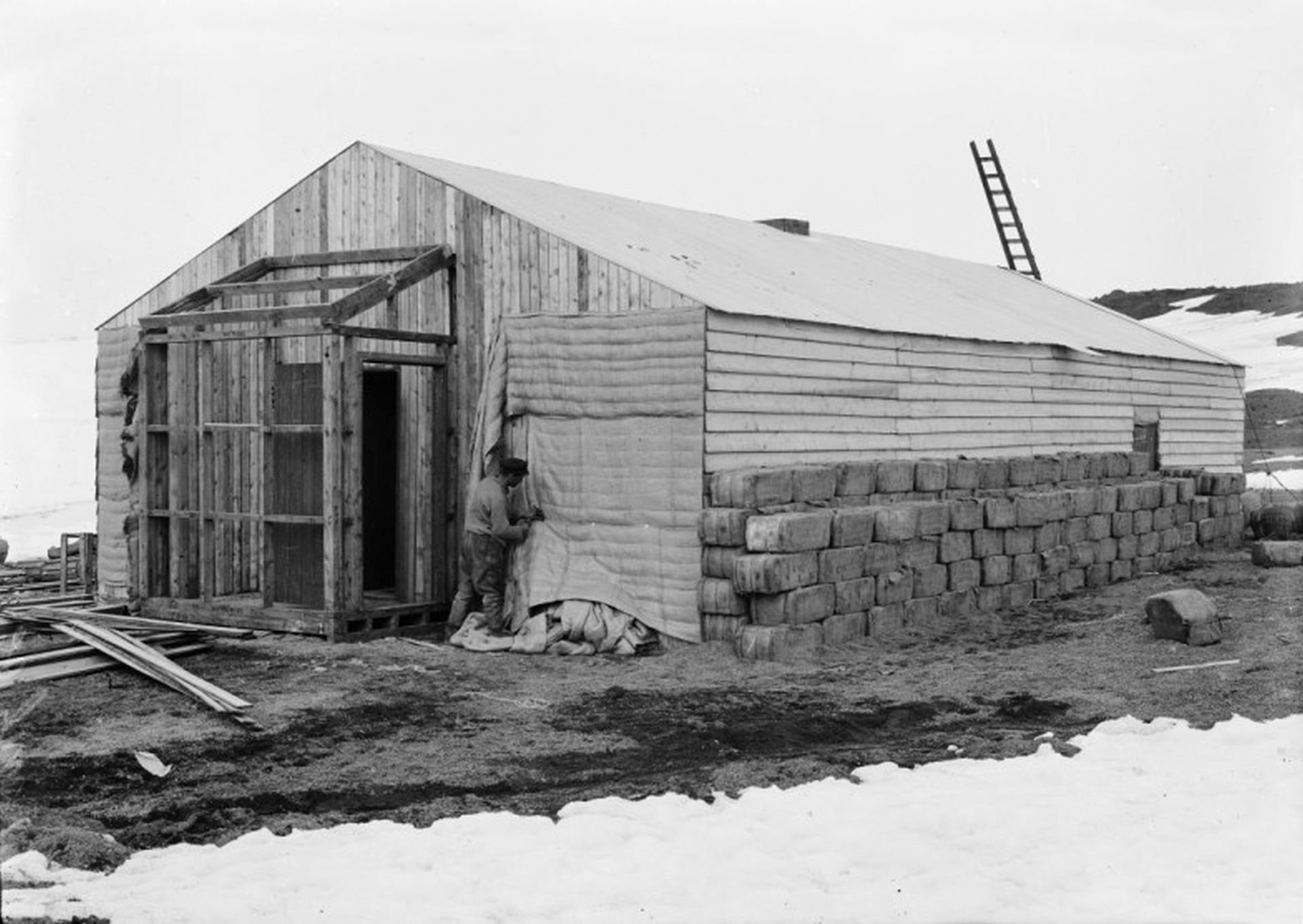 Davis, the carpenter, working on Terra Nova hut, January 9th 1911