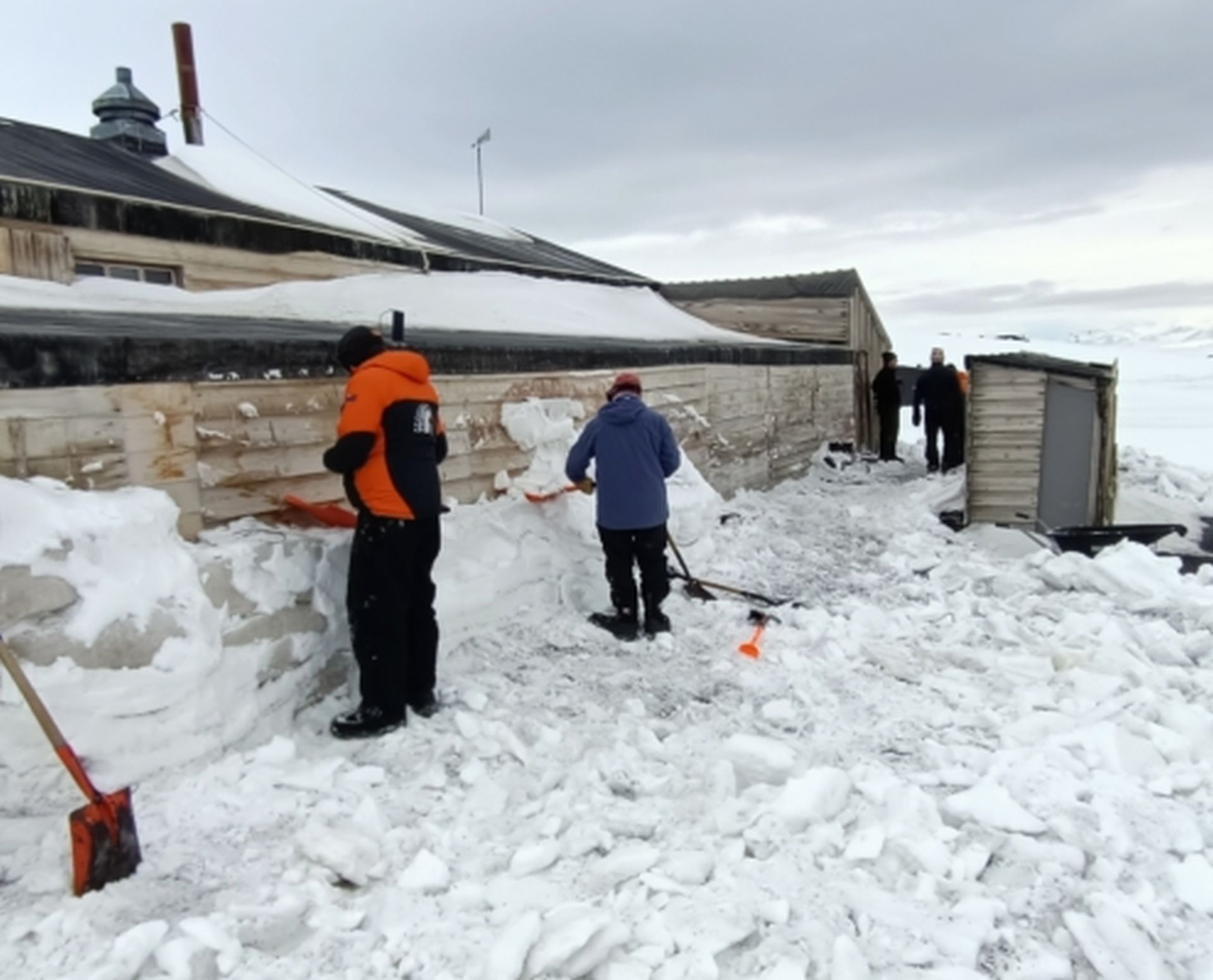 Snow removal at Scott’s Terra Nova Hut, Cape Evans.