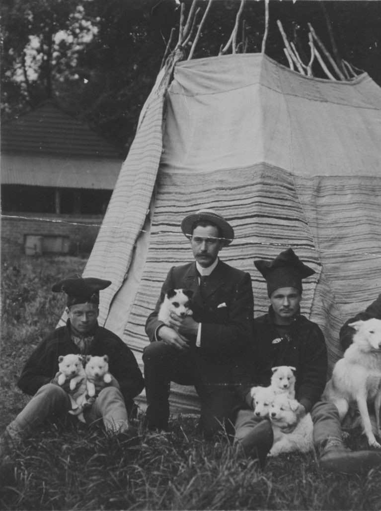 Ole Must, William Colbeck and Per Savio with some of the dogs prior to departure