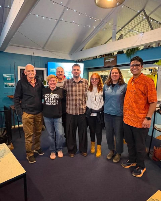 It was a special moment when the Trust’s four South Island-based Inspiring Explorers, Josiah Tualamali’i, Eliza McCracken, Libby Manning and Sam Dunlay reunited at the Naval Point Club in Lyttelton on a chilly evening to share their Antarctic experiences, says Eliza.

“The Naval Point Club is where some of our Inspiring Explorers™ team members first stepped aboard a boat during our Team Building Weekend in November 2025. We were excited to return and share our journey with the club, and acknowledge the important role it played in our preparation and support throughout the expedition.”

An engaged audience enjoyed hearing from the team members as they reflected on their adventure, the discoveries they made, and their gratitude for all who helped them along the way, Eliza adds.

“Each of us brought a different perspective on the expedition, which provided a well-rounded account of the experience. The presentation was warmly received and enjoyed by both club members and members of the wider Christchurch community who attended.”

📸Inspiring Explorers, Sam Dunlay (middle), Libby Manning, Eliza McCracken and Josiah Tualamali’i, with Naval Point Club manager, Sabrina Saunders, and club members during their visit. © AHT/Eliza McCracken.
Sam Dunlay sharing his insights with the audience. © AHT/Eliza McCracken.