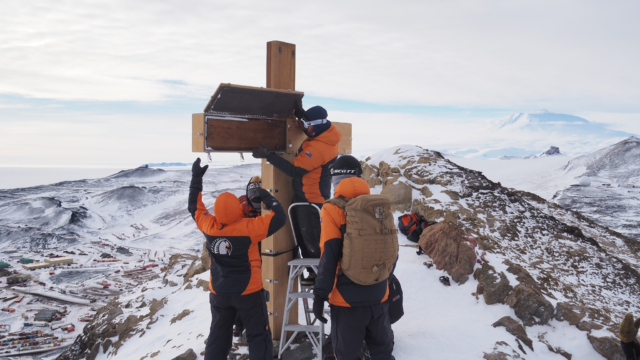 A team of seven from Scott Base recently had the privilege of removing the winter protective cover from the Observation Hill Cross, which commemorates Captain Robert Falcon Scott and his party, who lost their lives on the return journey from the South Pole in March 1912.

The Trust developed the temporary protective cover, which is installed each winter to help minimise erosion caused by Antarctica’s harsh conditions.

Persevering in the cold and blustery conditions at the top of Observation Hill, the team carefully removed the cover, revealing the cross piece by piece.

Task completed, everyone stood together in a moment of quiet reflection, taking in the significance of the place and the memorial it holds.

📷 © @antarctica.nz/Sophia White